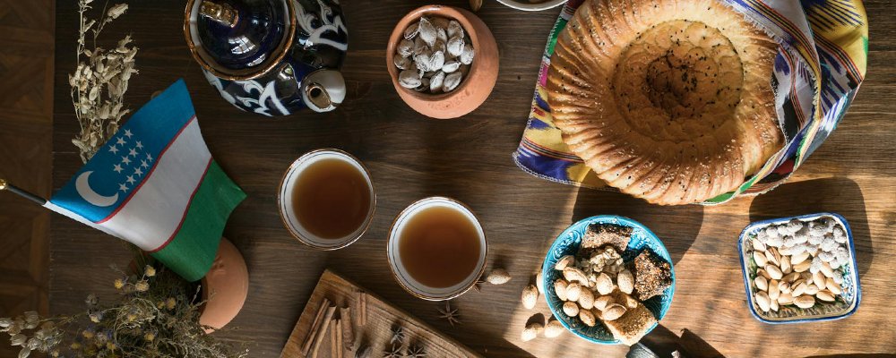 Slurping Tea and Munching on Good Luck Bread - Uzbekistan - The Wise Traveller - Uzbek Food table