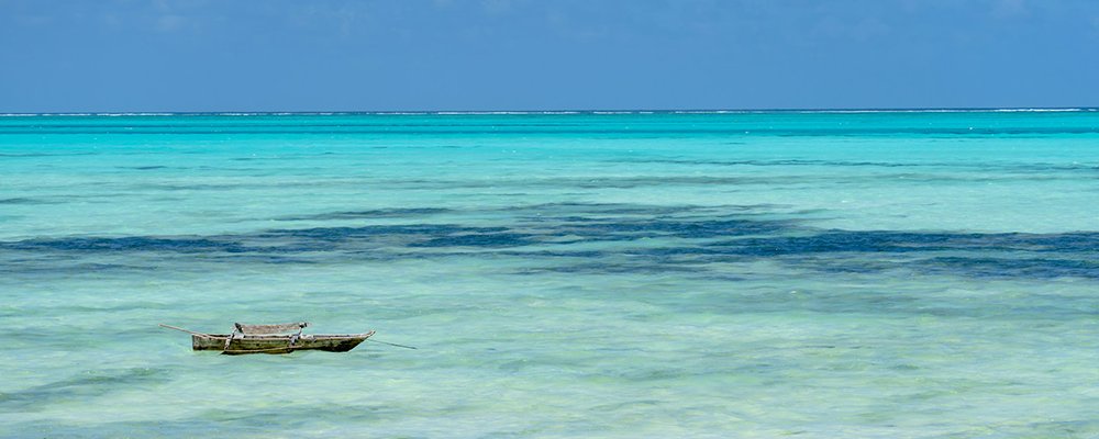 Sun Worshipping on a Zanzibar Beach - The Wise Traveller - Jambiani